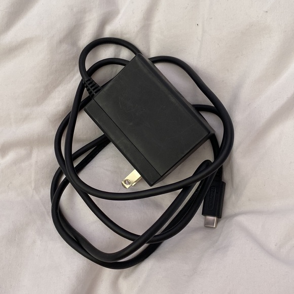 Mint condition Nintendo Switch plus charger. - Picture 3 of 3